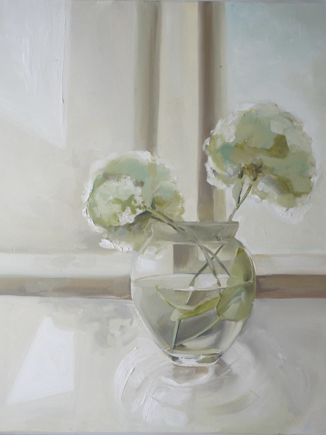 White hydrangeas in a glass vase
